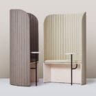 Two Focus Pod Easy Chairs in an office with a table