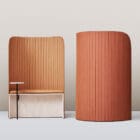 Front and back view of the Focus Pod Easy Chair in an office with a table