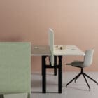Optima Duo side view at a desk with chairs