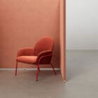 Optima Floor in an office with a red chair in front