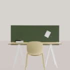Optima Table product shot with a chair at a desk in green