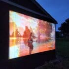 Smarter Surfaces Outdoor Projector Screen Paint in a residential setting outdoors