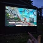 Smarter Surfaces Outdoor Projector Screen Paint on the side of a home