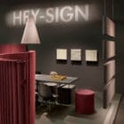 The HEY-SIGN wall module wave square in use in an office setting