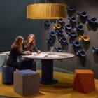 The Loop acoustic element from HEY-SIGN in use in a reception or meeting area
