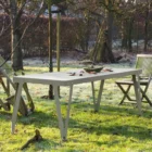 Lloyd table outdoor by Functionals in a garden