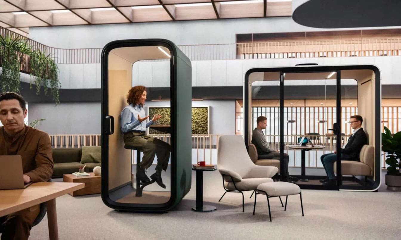 6704a26bf46c7fd885276bee 6704a05e8ac6d0941e2aa7a9 framery one compact in open plan office video call 1344x806 1