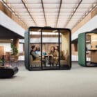 Framery Four in a modern workplace with people inside 