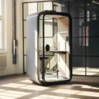 Framery One with a white exterior in a modern workspace