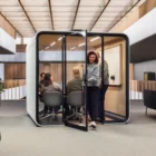 Framery Six with people using it as a meeting room